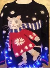 Cat Christmas Sweaters are a Purrfectly Tacky Party Favorite
